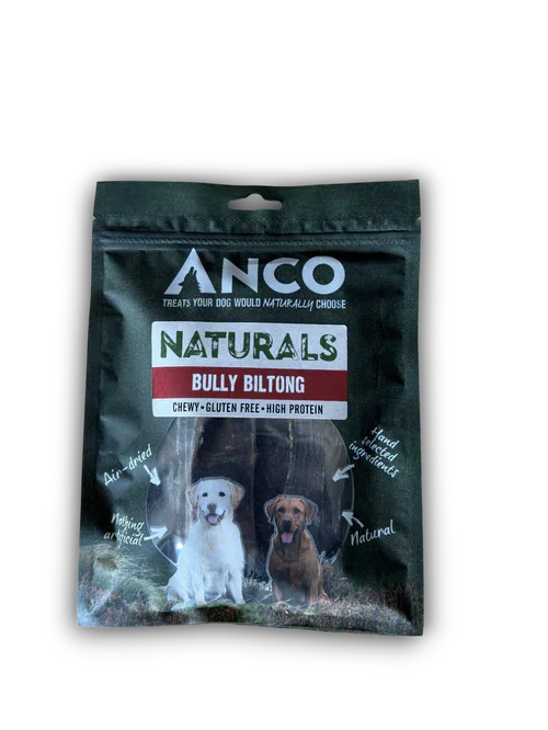 NCO Naturals Bully Biltong dog treats package with images of two dogs, labeled chewy, gluten free, high protein