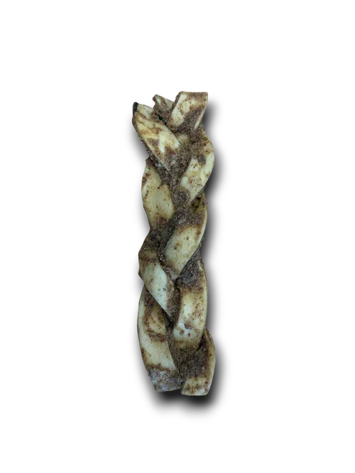 Twisted dog chew treat with a speckled brown and beige textured surface on black background