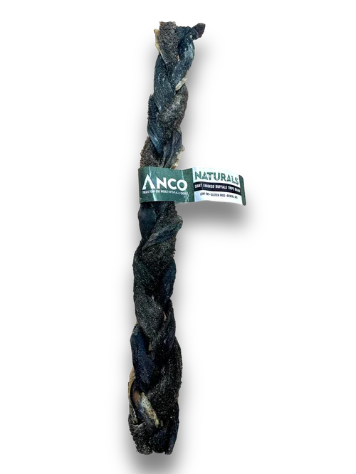 Anco Naturals giant smoked buffalo twisted dog chew treat with green and white label on black background