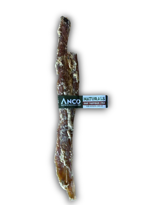 Anco Naturals Giant Paddywack Stick dog chew treat against black background