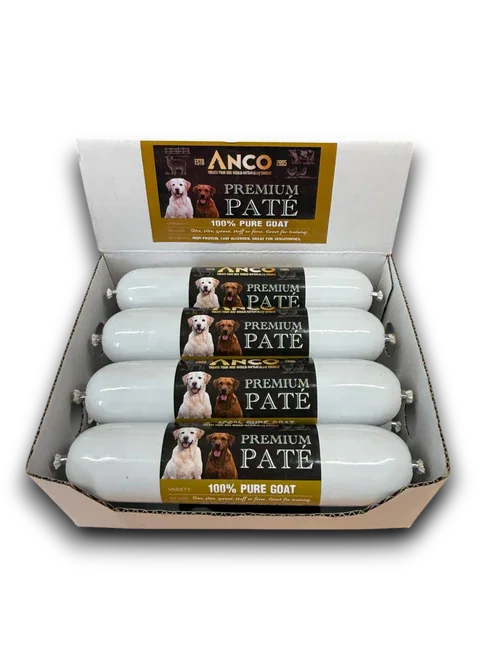 Box of four ANCO Premium Paté 100% Pure Goat dog food rolls with labels showing two dogs
