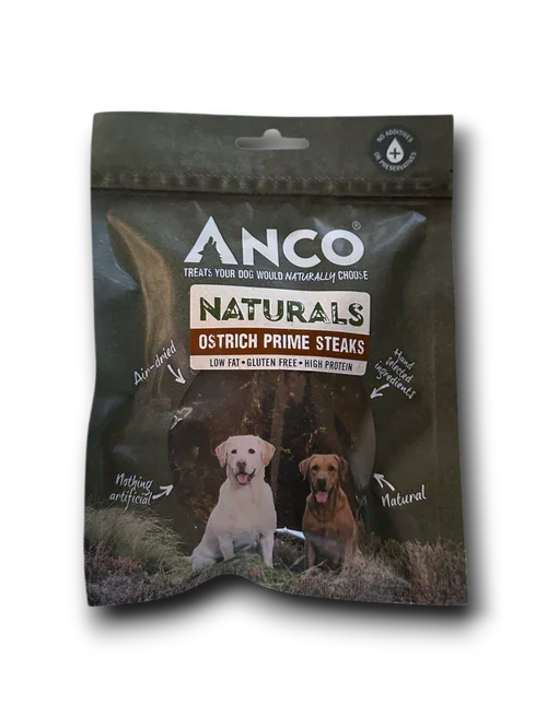 Anco Naturals Ostrich Prime Steaks dog treats package featuring two dogs, emphasizing natural, low fat, gluten-free, high protein ingredients